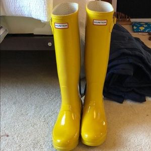 Tall yellow hunter boots